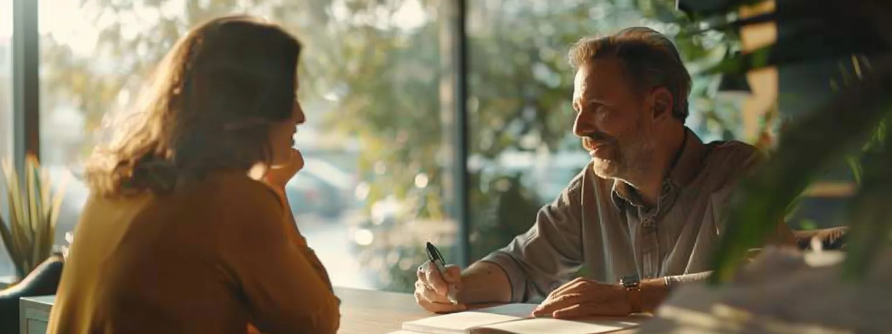 a person consulting with their accountant and discussing insurance premiums and deductibles.